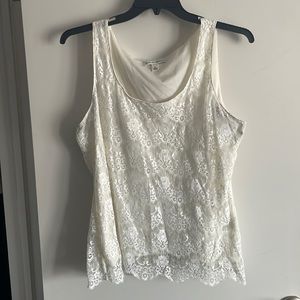 Cream sleeveless top with scalloped hem and lace overlay